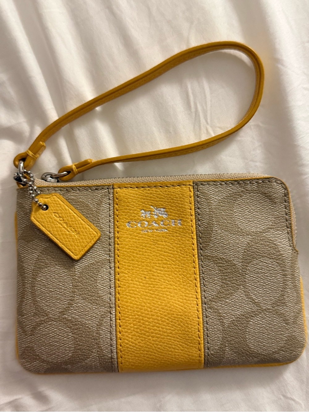 Coach Beige Signature Canvas Wristlet with Yellow Leather Center Stripe